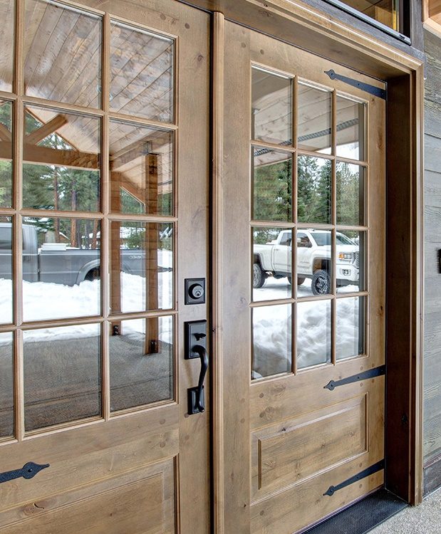 Knotty alder entry doors and matching trim